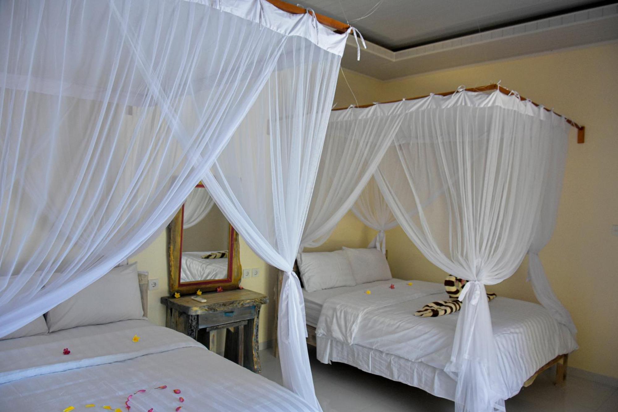 Hotel Ganesha Amed Zimmer foto